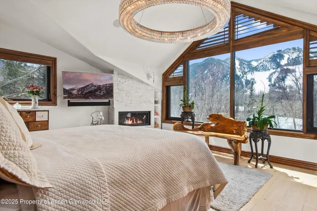 a front view of a house with garden and patio