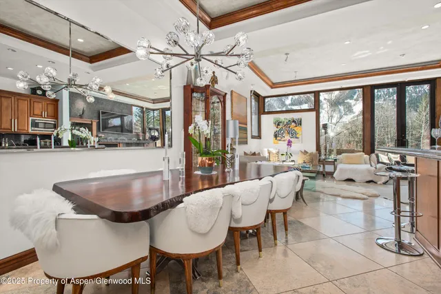 a bedroom with a bed and a table in it