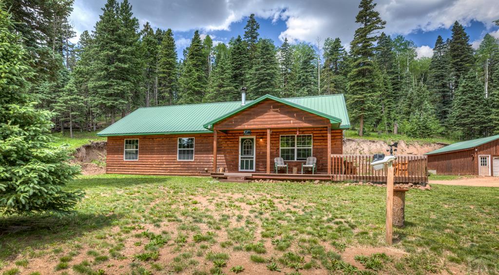 331 Westcliffe Drive Rye, CO 81069 - Photo 1 of 48 front view of a house with a yard