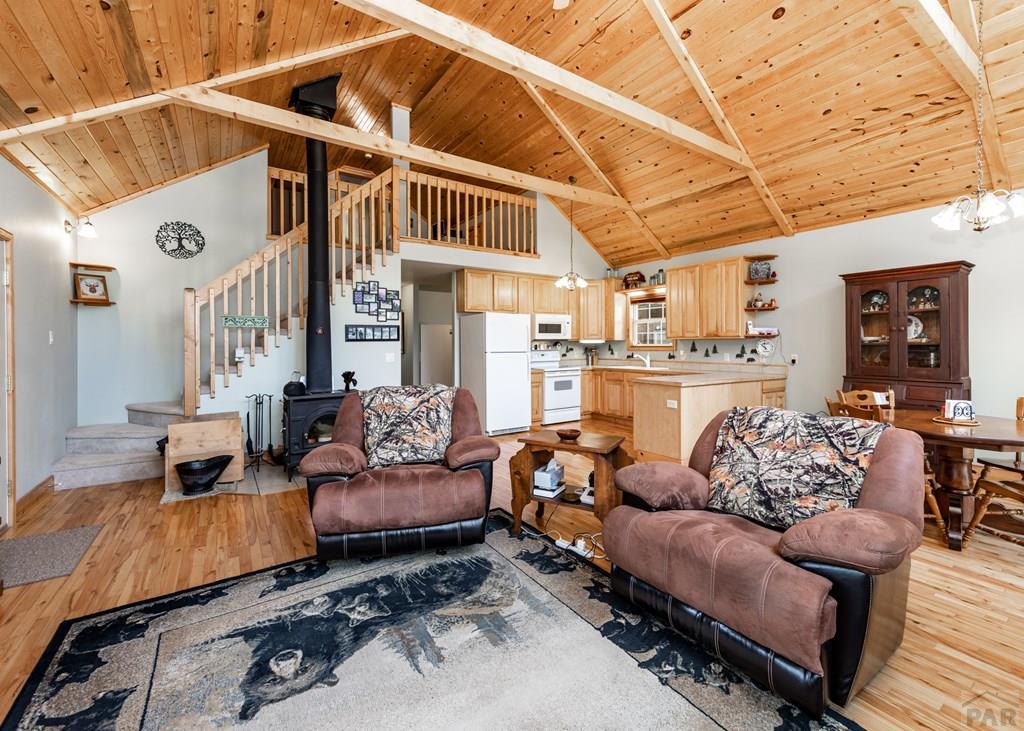331 Westcliffe Drive Rye, CO 81069 - Photo 15 of 48 a living room with furniture and wooden floor