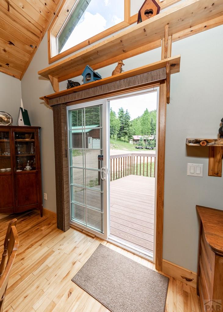 331 Westcliffe Drive Rye, CO 81069 - Photo 19 of 48 a view of a porch with a table and chairs