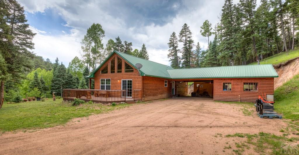 331 Westcliffe Drive Rye, CO 81069 - Photo 2 of 48 front view of a house with a yard