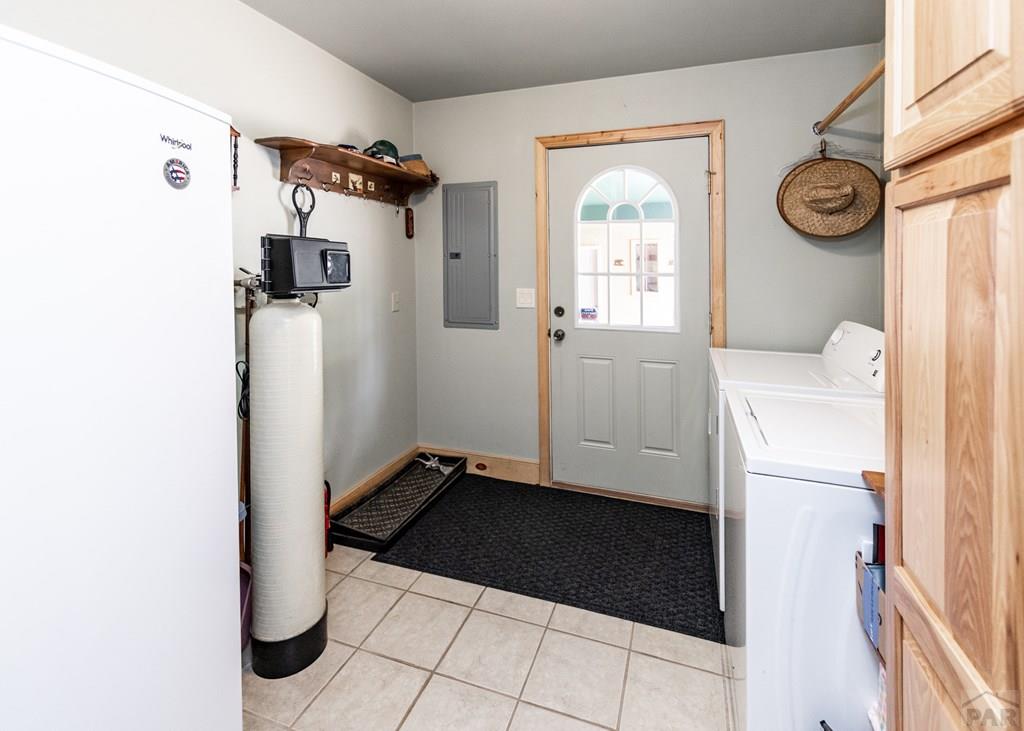 331 Westcliffe Drive Rye, CO 81069 - Photo 41 of 48 a view of a hallway with wooden floor and a window