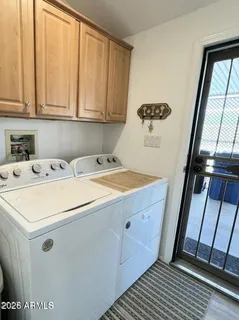 a utility room with dryer and washer