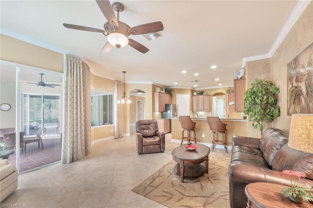 21093 Torre Del Lago Street Estero, FL 33928 - Photo 13 of 37 a living room with furniture and a large window