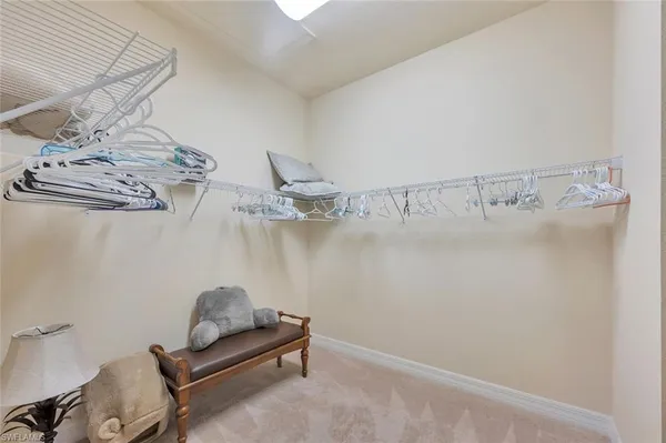 a view of a room with racks on the wall