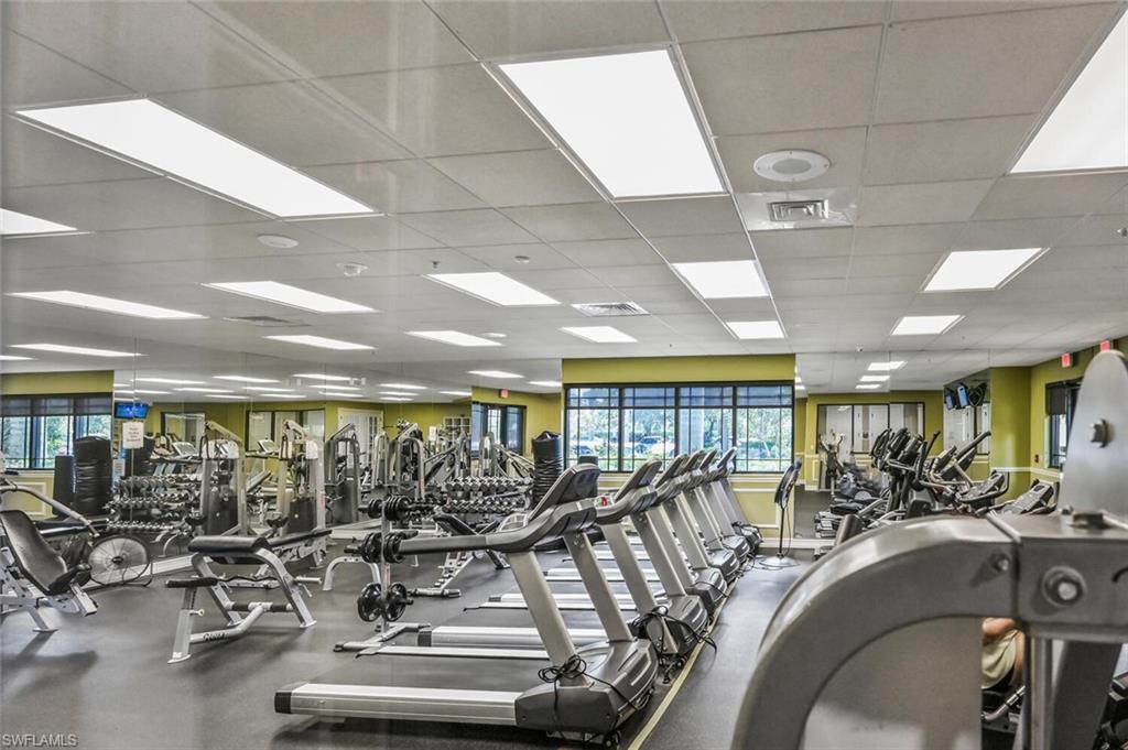 21093 Torre Del Lago Street Estero, FL 33928 - Photo 31 of 37 a view of a room with gym equipment