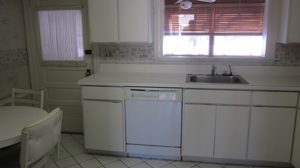 39 Sevinor Road Marblehead, MA 01945 - Photo 5 of 8 a kitchen with a sink cabinets and window
