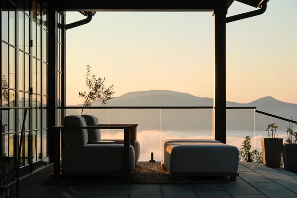 a living room with furniture and a window