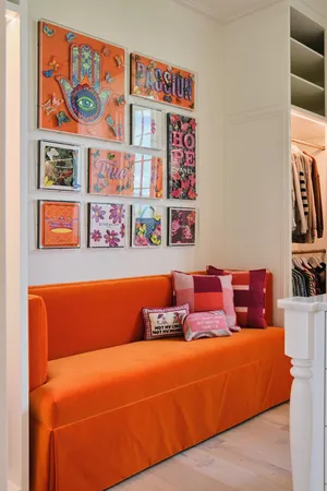 a view of a balcony with chairs and wooden floor