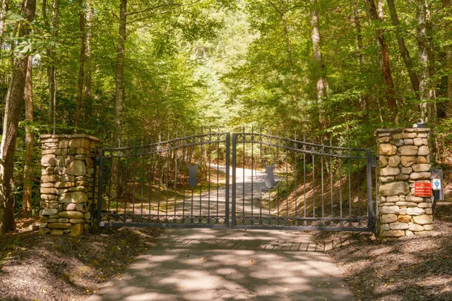 a view of a patio with a table under an umbrella