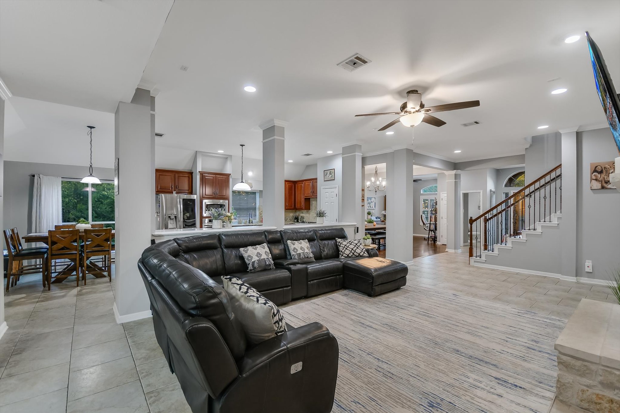 300 Wesley Ridge Drive Spicewood, TX 78669 - Photo 40 of 40 a living room with furniture and a chandelier
