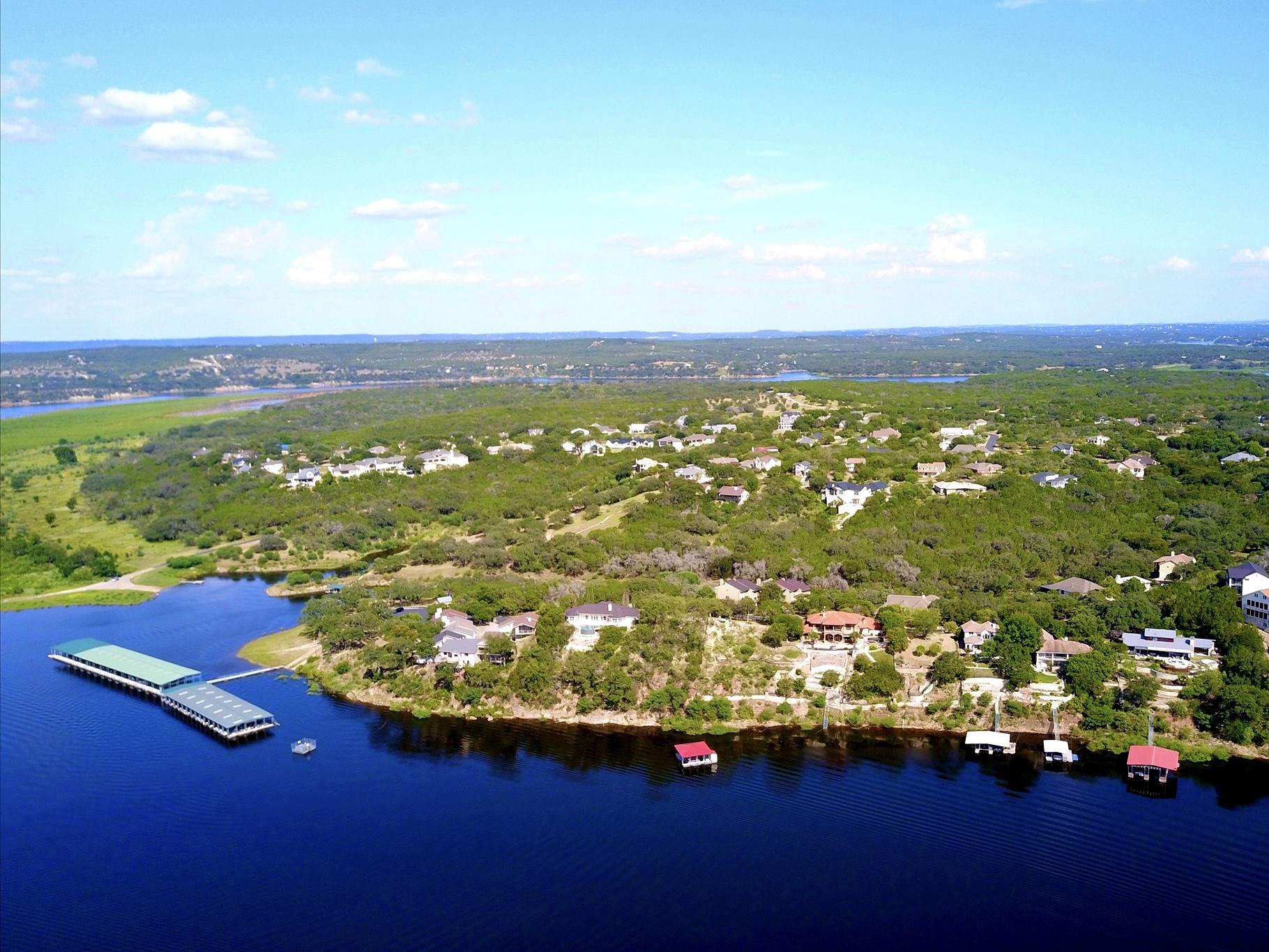 300 Wesley Ridge Drive Spicewood, TX 78669 - Photo 3 of 40 an aerial view of residential houses with outdoor space