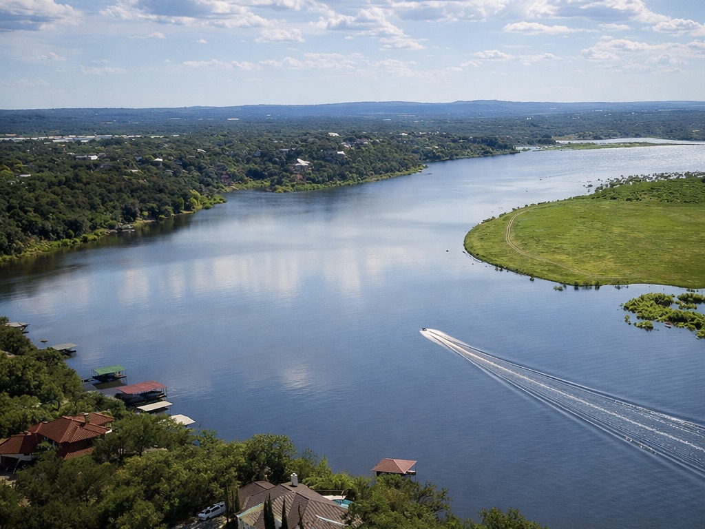 300 Wesley Ridge Drive Spicewood, TX 78669 - Photo 30 of 40 a view of a lake with a mountain