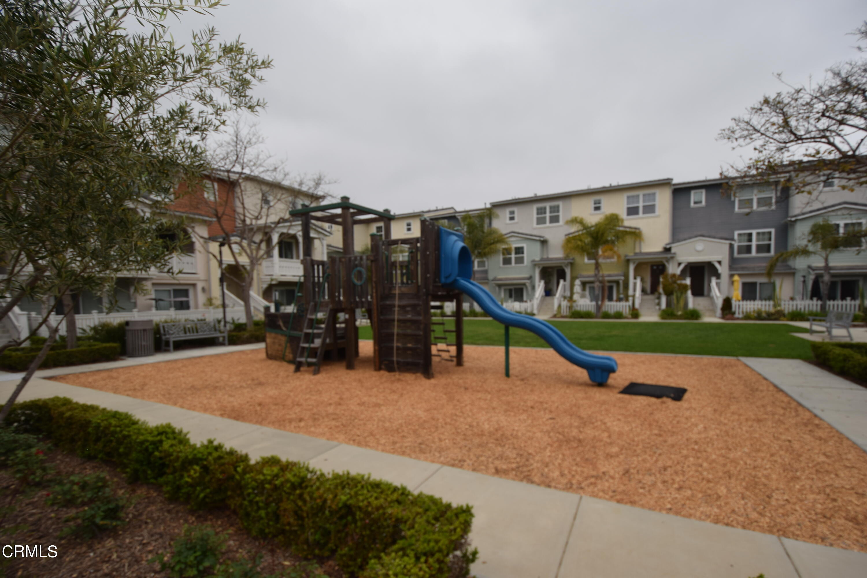 3755 Islander Walk Oxnard, CA 93035 - Photo 18 of 20 a view of a house with a park
