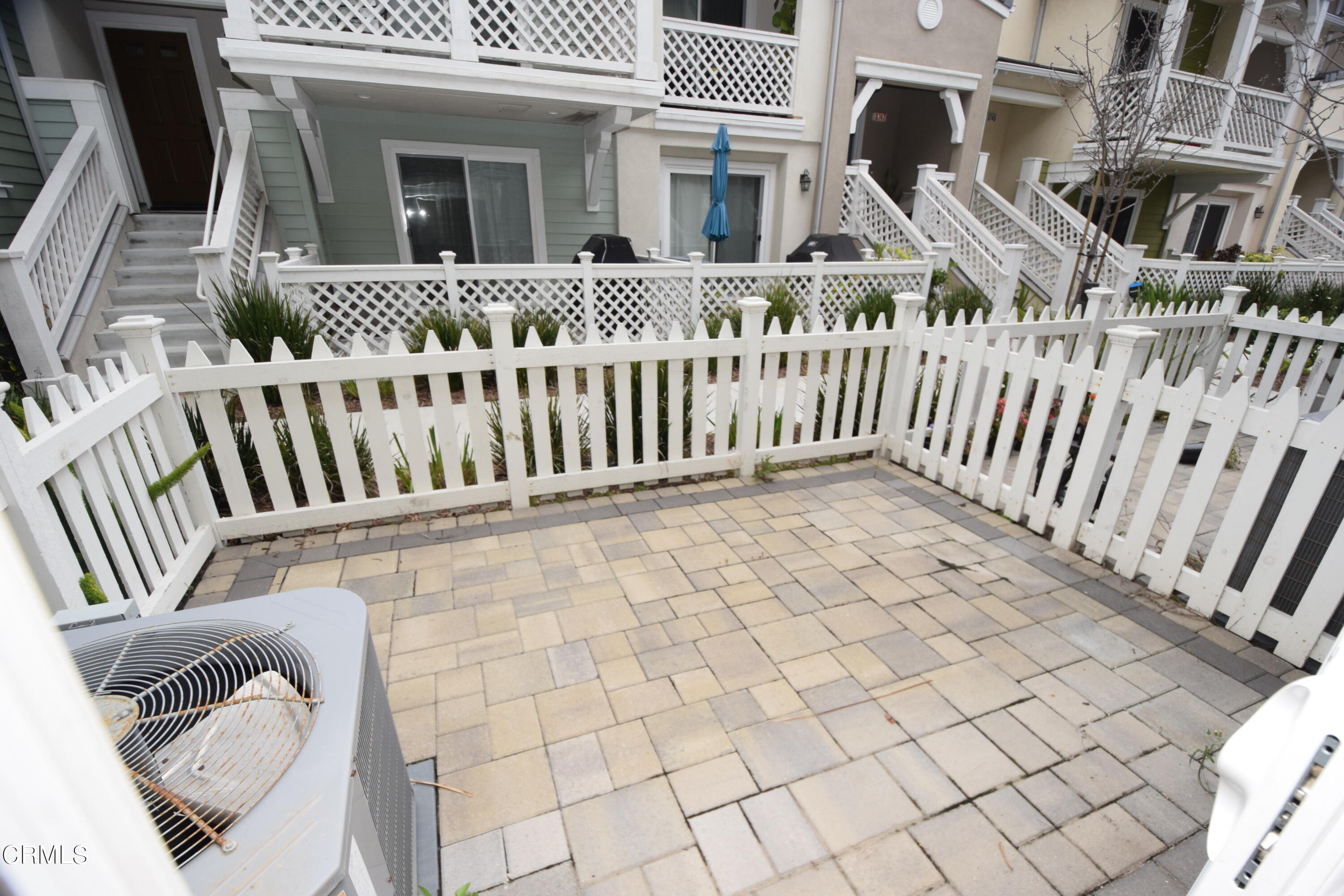 3755 Islander Walk Oxnard, CA 93035 - Photo 5 of 20 a view of a house with wooden fence