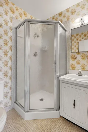 an aerial view of a house with a garden