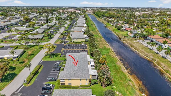 a view of a room with gym equipment and a large window