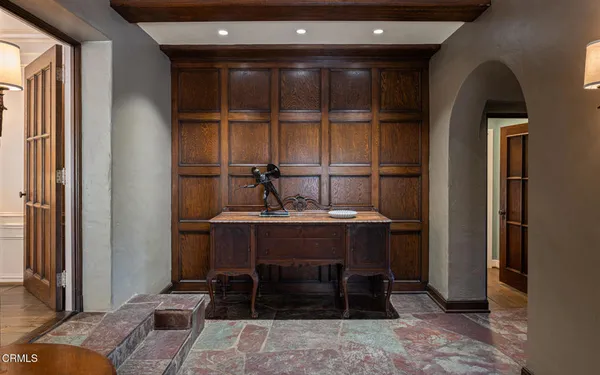 a bathroom with a sink and mirror