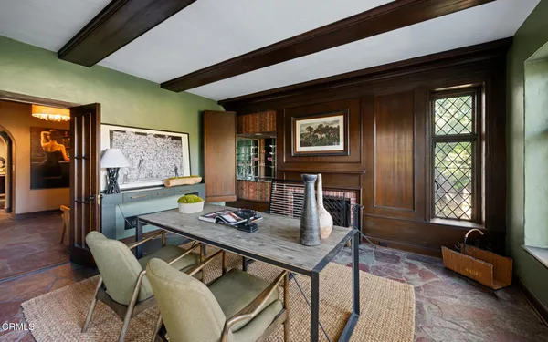 a view of a livingroom with furniture and window