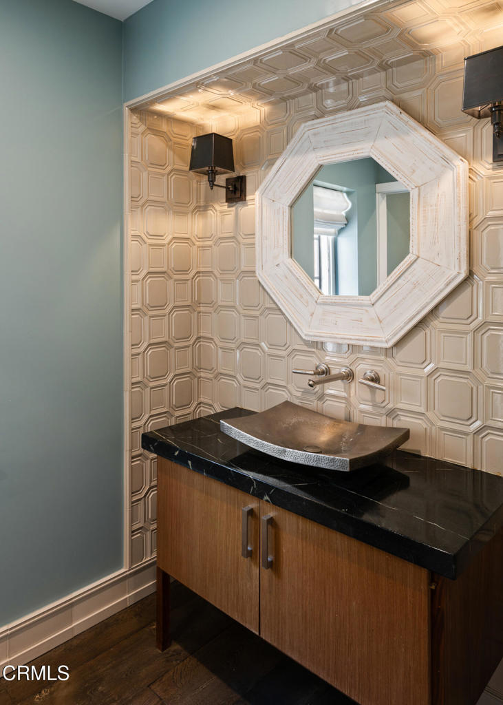 1146 Shenandoah Road San Marino, CA 91108 - Photo 15 of 38 a bathroom with a sink and a mirror