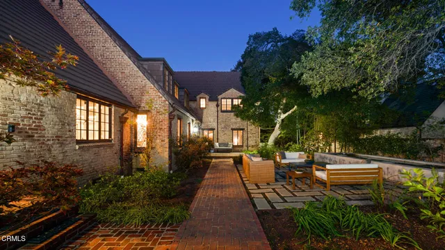 a view of yard with patio