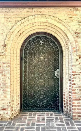 a view of a livingroom with furniture and front door