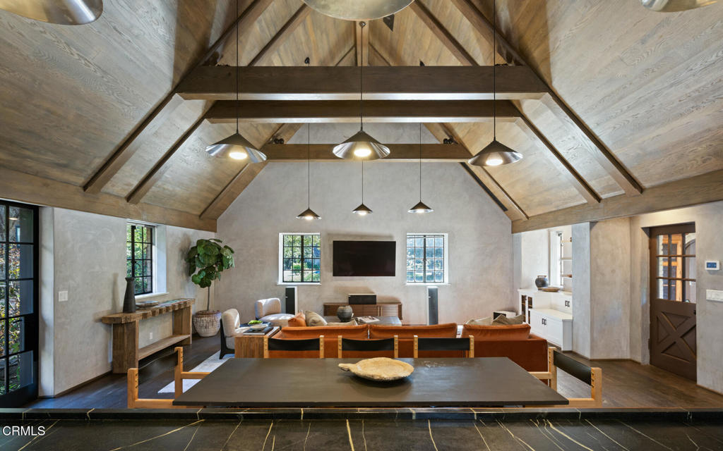 1146 Shenandoah Road San Marino, CA 91108 - Photo 8 of 38 a living room with dining table and a fireplace