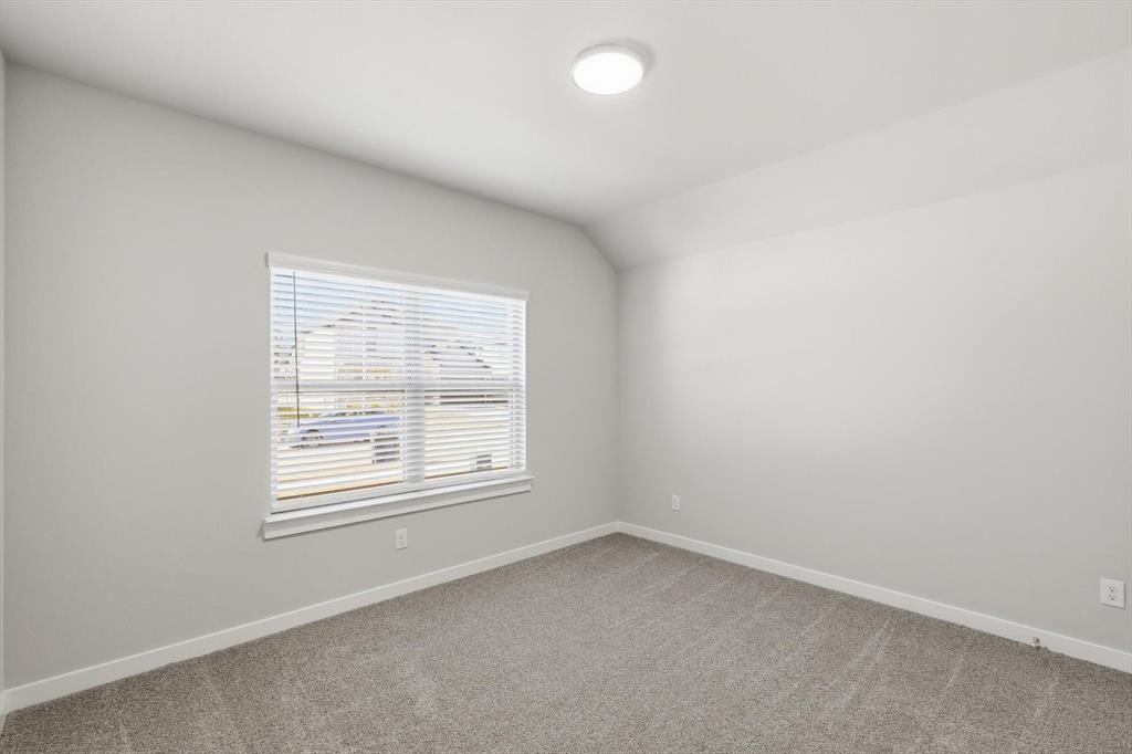 14908 Dust Storm Trail Haslet, TX 76052 - Photo 11 of 20 an empty room with a window