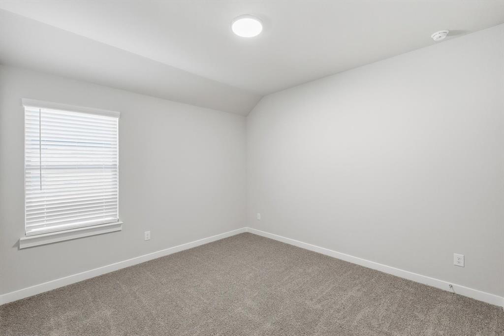 14908 Dust Storm Trail Haslet, TX 76052 - Photo 13 of 20 an empty room with a window