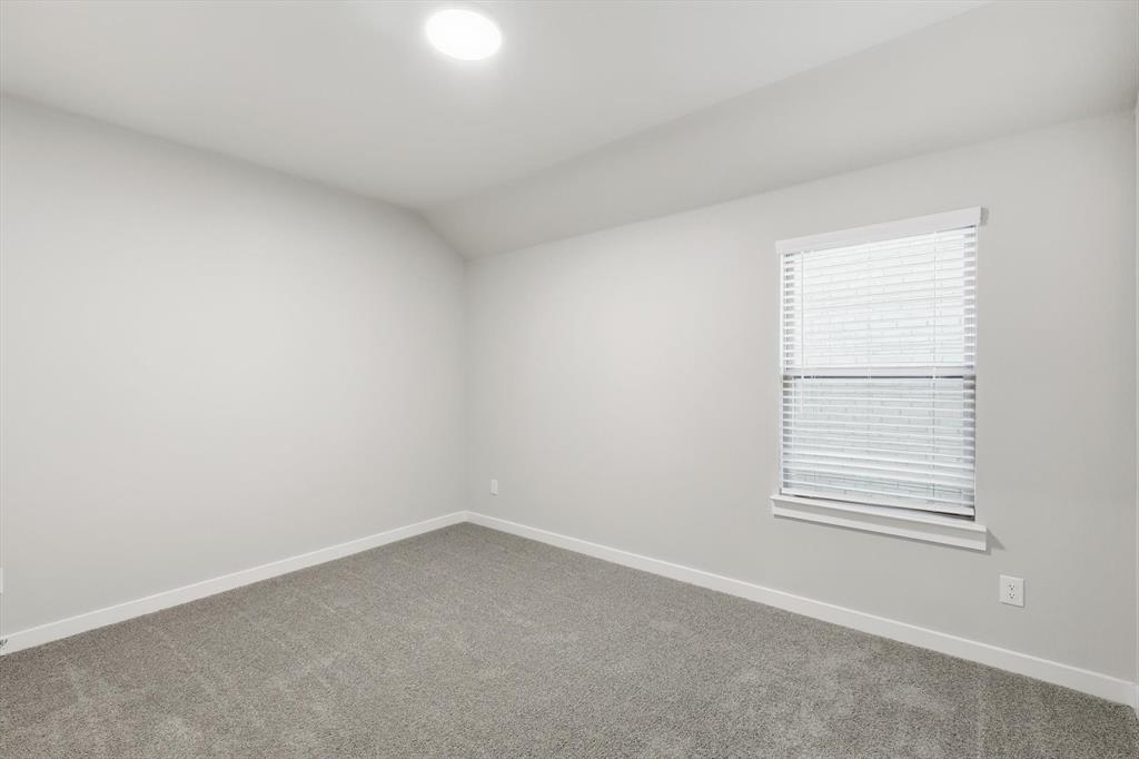 14908 Dust Storm Trail Haslet, TX 76052 - Photo 15 of 20 an empty room with a window