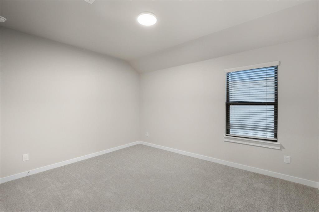 14908 Dust Storm Trail Haslet, TX 76052 - Photo 16 of 20 an empty room with a window