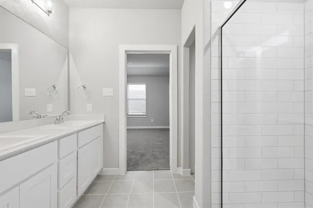 a view of storage and utility room with washer and dryer