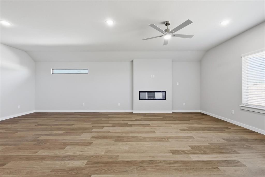 14908 Dust Storm Trail Haslet, TX 76052 - Photo 5 of 20 a view of an empty room with a window