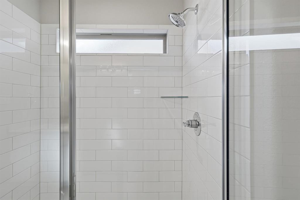 14908 Dust Storm Trail Haslet, TX 76052 - Photo 10 of 20 a bathroom with a shower