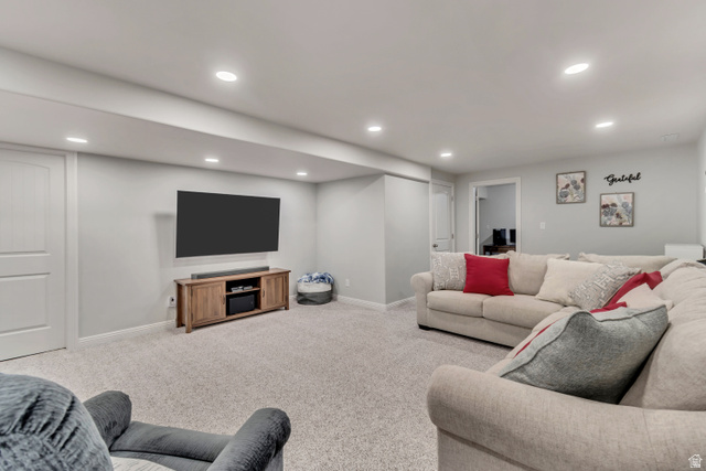 356 North 230 West Payson, UT 84651 - Photo 26 of 45 Spacious entertainment area featuring light gray walls, recessed lighting, and soft gray carpeting