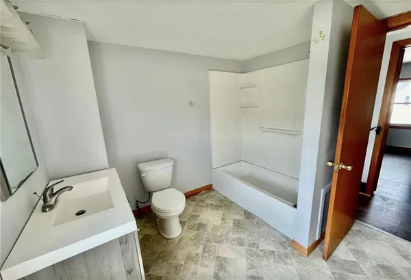 a bathroom with a sink and a tub