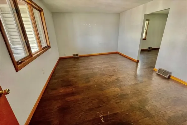 an empty room with windows