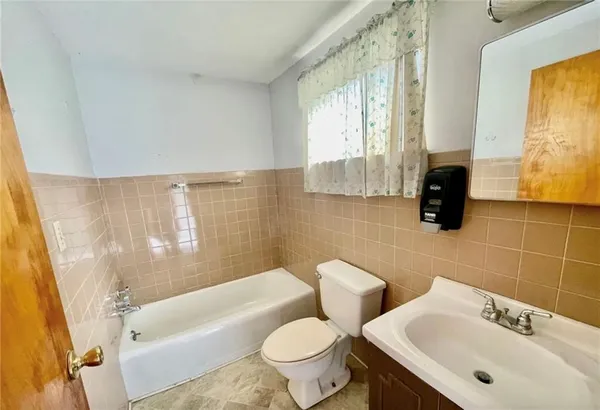 a bathroom with a sink and a bathtub