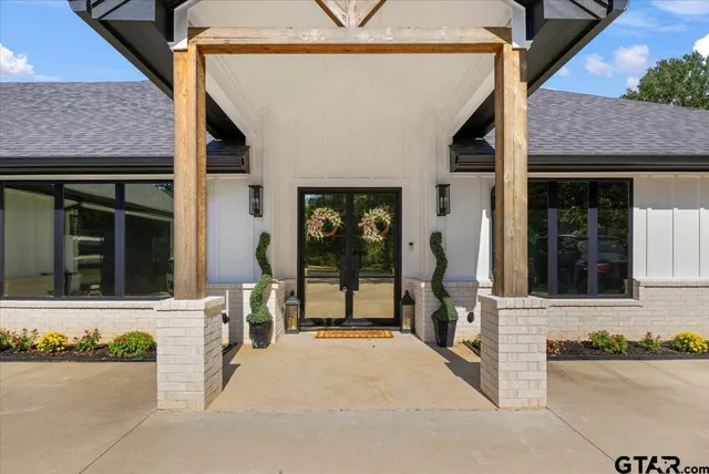 front view of a house with a small yard