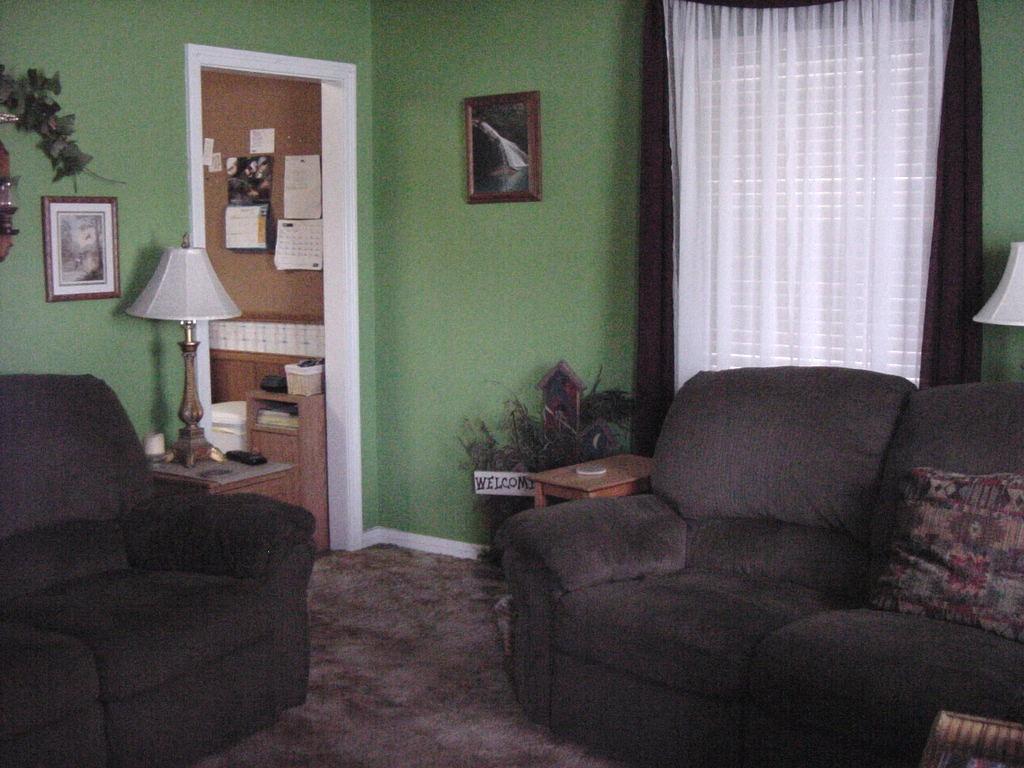 301 Southwest 45th Avenue Amarillo, TX 79110 - Photo 11 of 19 a living room with furniture and a window