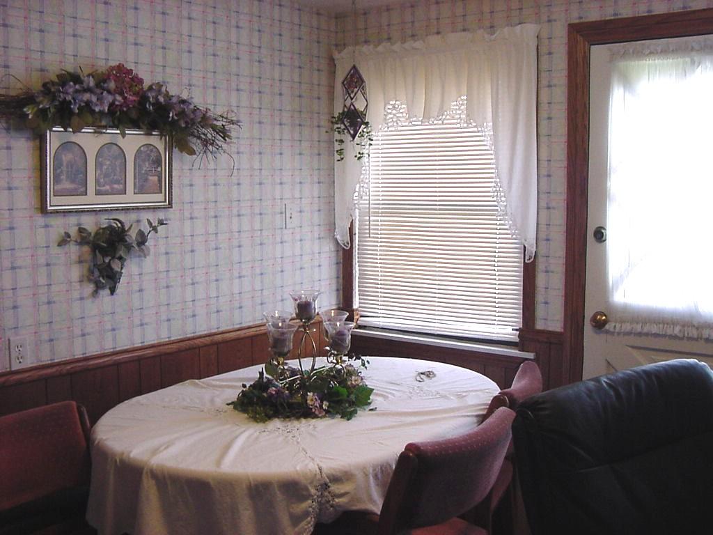 301 Southwest 45th Avenue Amarillo, TX 79110 - Photo 15 of 19 a dining room with furniture and window