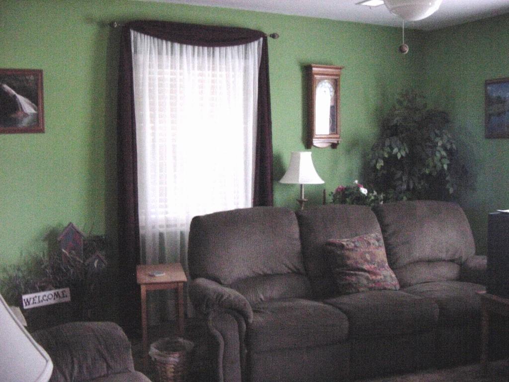 301 Southwest 45th Avenue Amarillo, TX 79110 - Photo 10 of 19 a living room with furniture and a window