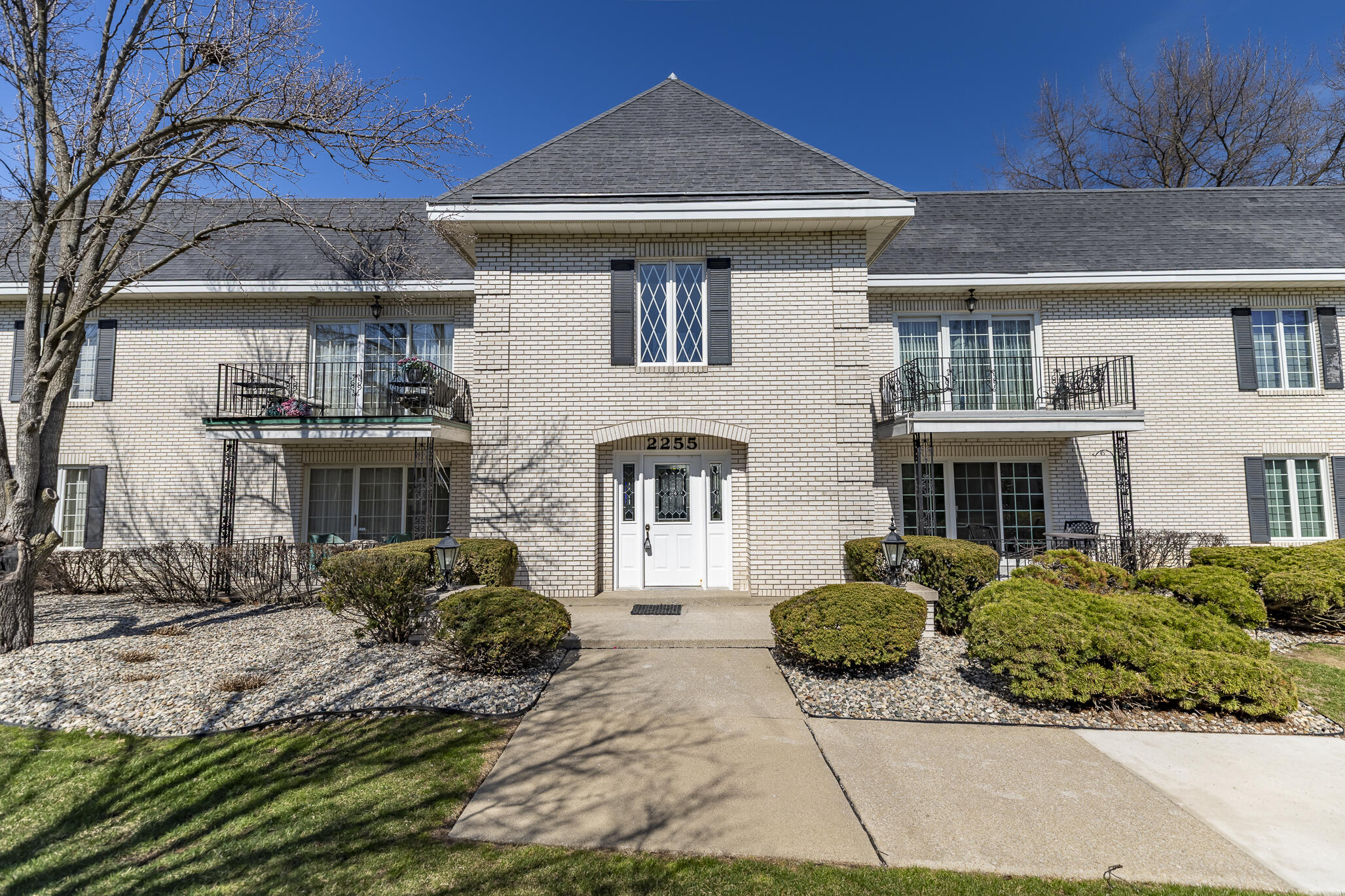 2255 Bordeaux, Unit B1 Highland, IN 46322 - Photo 2 of 49 a front view of a house with garden