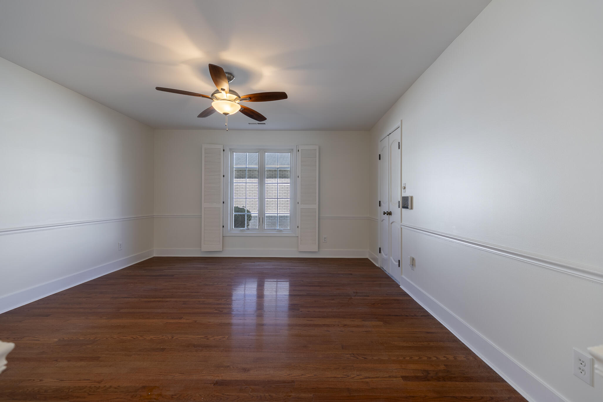 2255 Bordeaux, Unit B1 Highland, IN 46322 - Photo 21 of 49 wooden floor in an empty room with a window