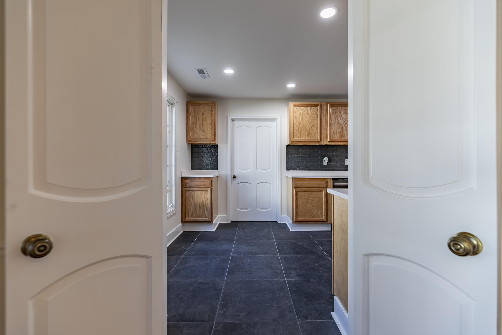 2255 Bordeaux, Unit B1 Highland, IN 46322 - Photo 24 of 49 a kitchen with granite countertop a refrigerator and a stove