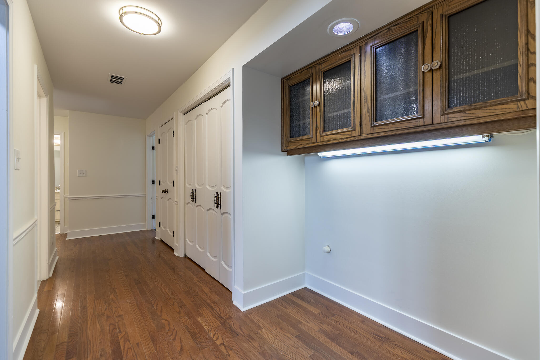 2255 Bordeaux, Unit B1 Highland, IN 46322 - Photo 28 of 49 a view of an empty room with wooden floor and a window