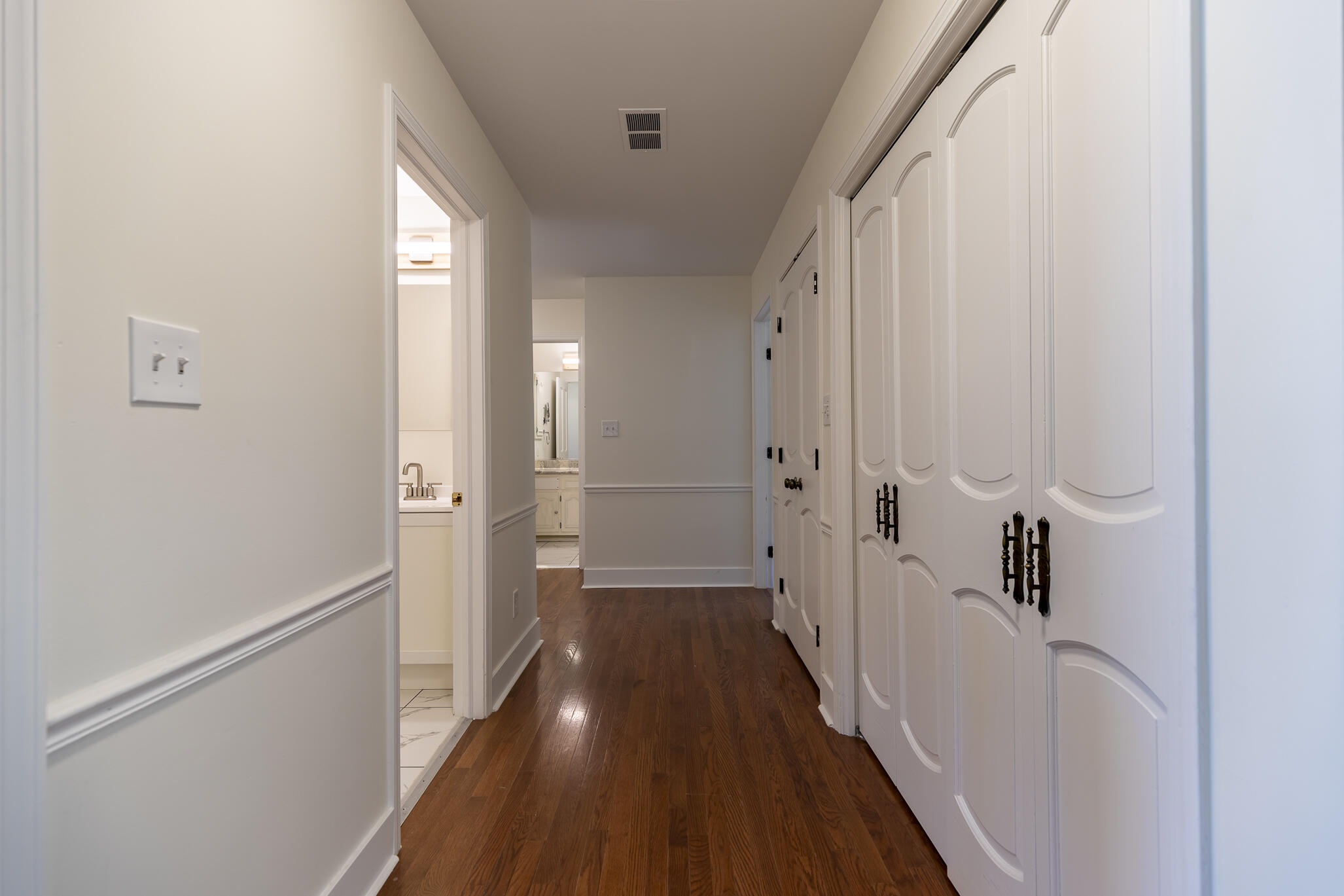 2255 Bordeaux, Unit B1 Highland, IN 46322 - Photo 30 of 49 a view of a hallway with wooden floor and staircase