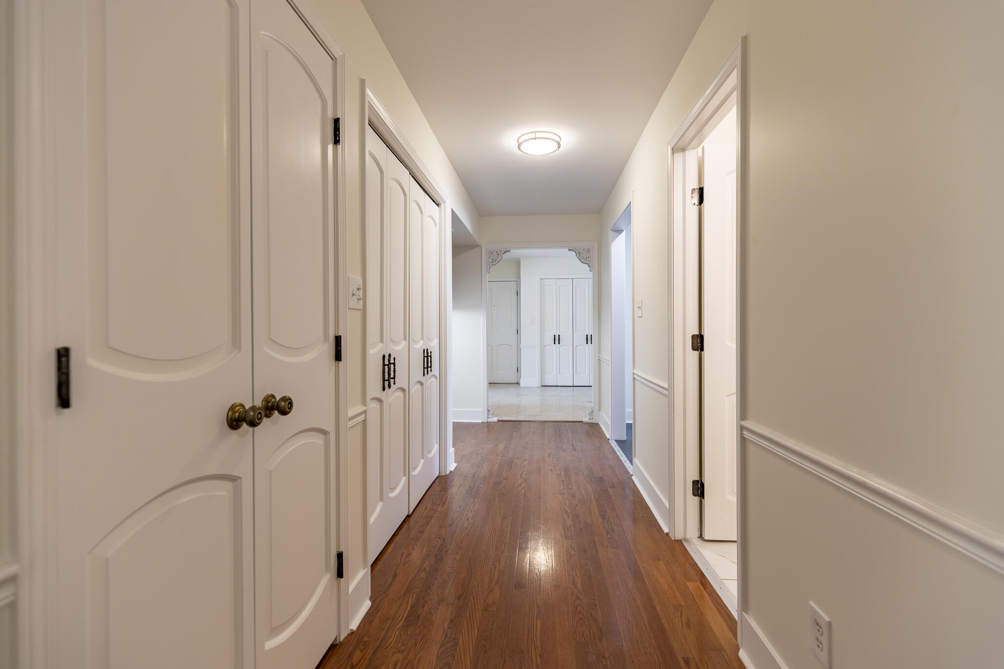 2255 Bordeaux, Unit B1 Highland, IN 46322 - Photo 33 of 49 a view of a hallway with wooden floor and closet