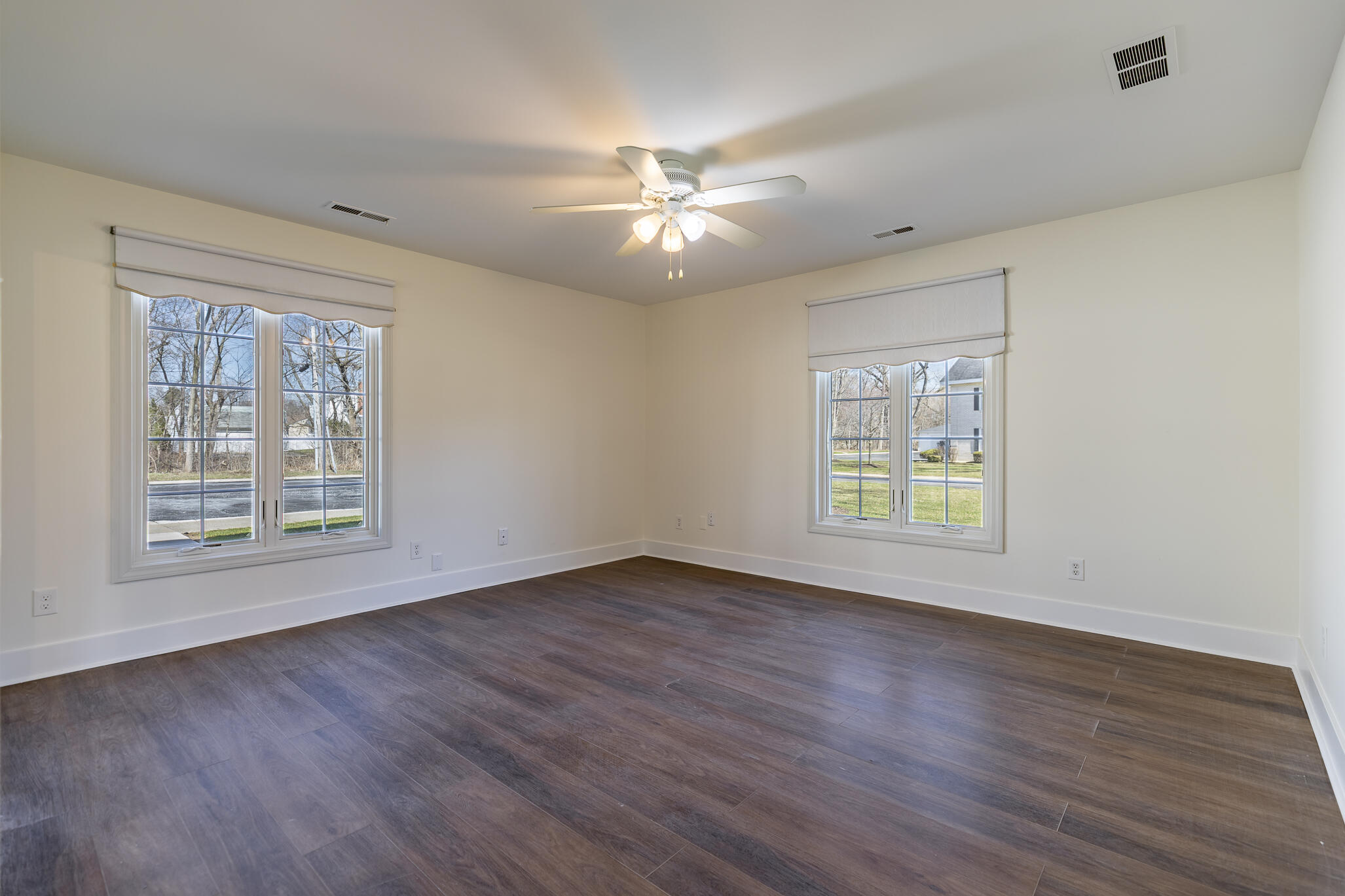 2255 Bordeaux, Unit B1 Highland, IN 46322 - Photo 44 of 49 a view of an empty room with wooden floor and a window